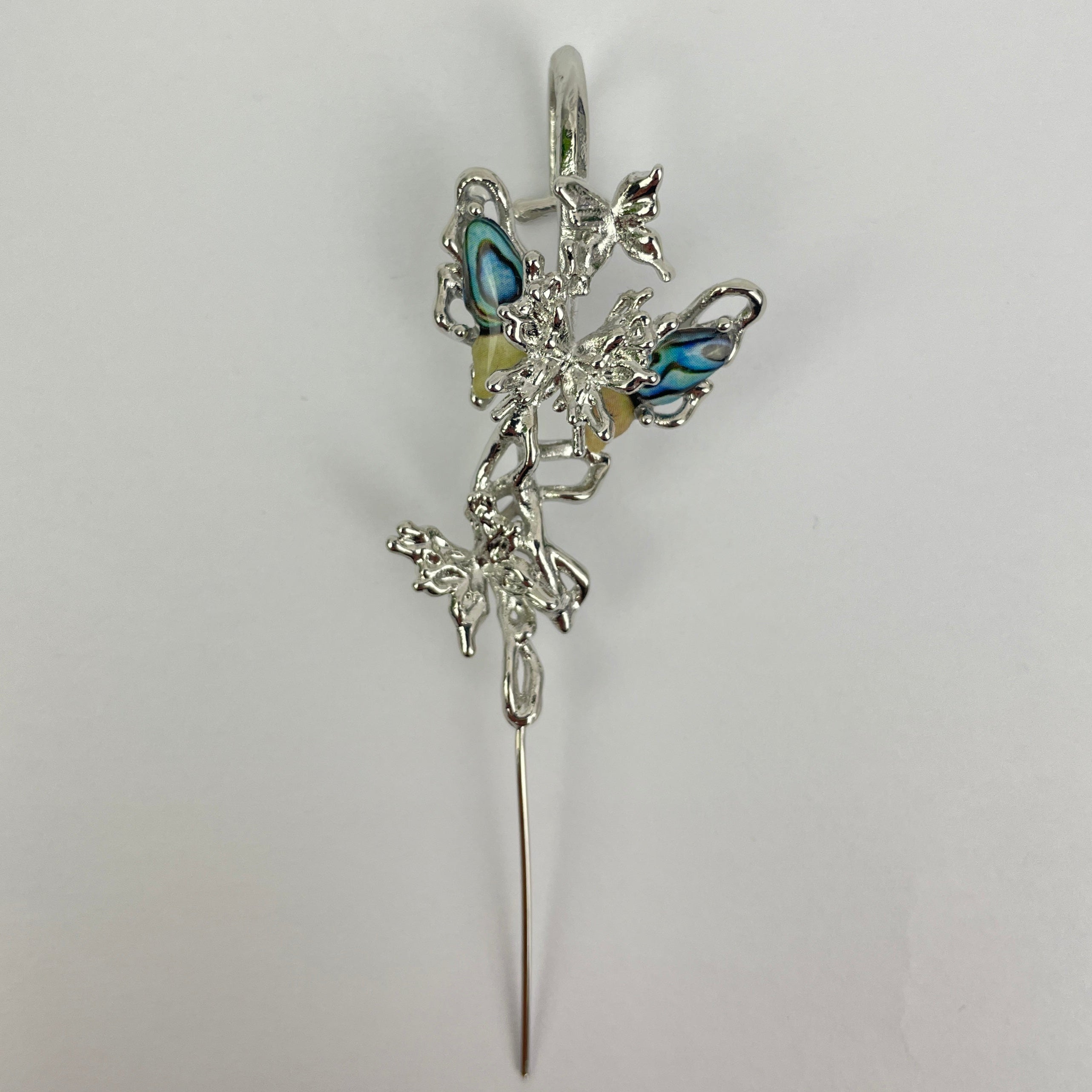 Silver bracelet with blue stones on a white background
